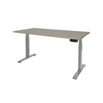 Ergonomisch elektrisch zit-sta bureau met licht eikenhouten blad en wit frame. - Elektrisch Zit-Sta Bureau OFI DYNAMO – NPR 1813 & Ergonomisch - Office Furniture Interior